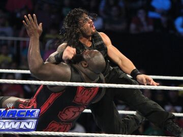 Roman Reings y Mark Henry