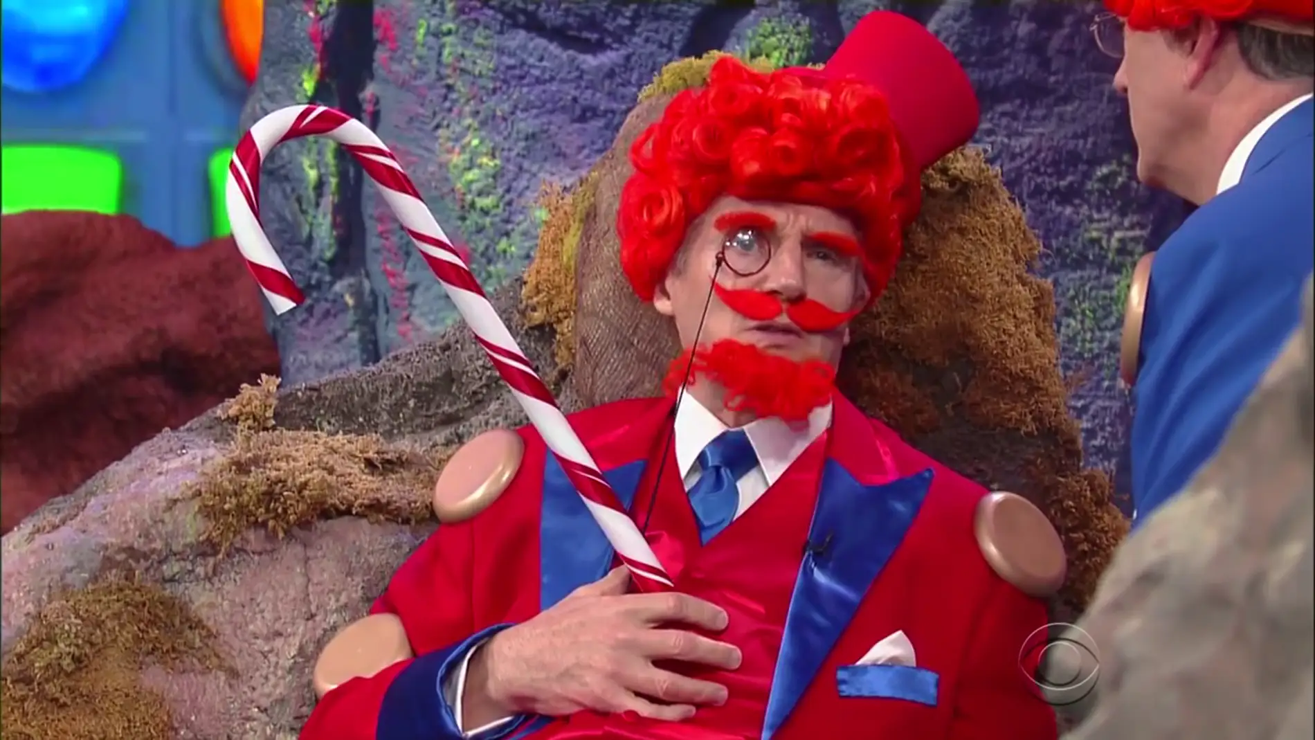 Liam Neeson como Mr. Toffee