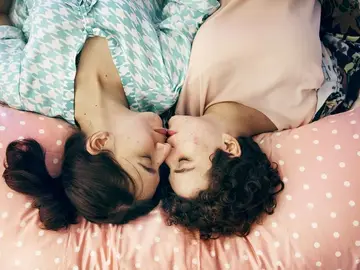 Pareja en la cama Pareja en la cama