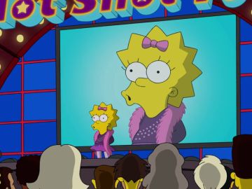 Homer presenta a Maggie a un concurso de talentos