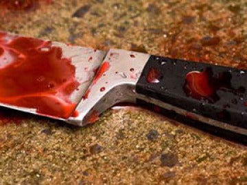 Imagen de archivo de un cuchillo ensangrentado