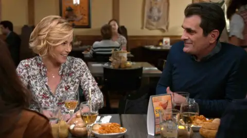 Claire y Phil Modern Family