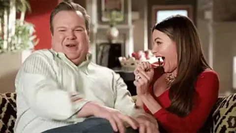 Cam y Gloria Modern Family